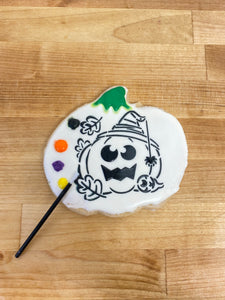 Halloween jack-o’-lantern Paint & Eat cookie